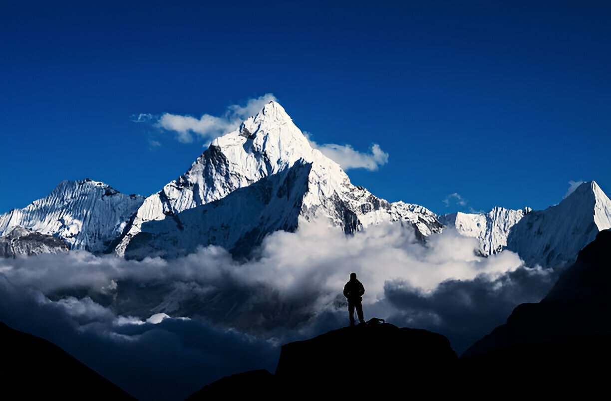 Traveler standing in EBC and adoring Magnifying Everest